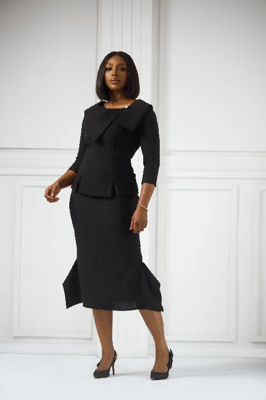 Midi Dresses in Dotted Pattern -Erilyn Nkiru set with a fitted top and midi-length skirts